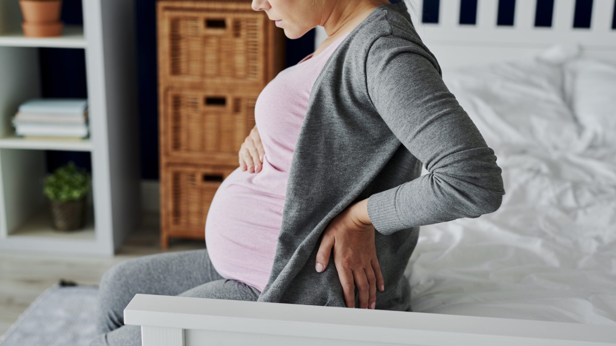 Pregnant woman feeling pain in the back